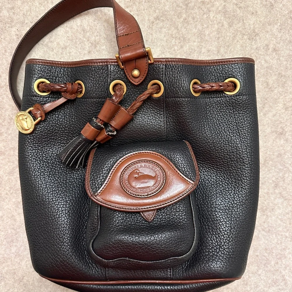 Vintage Dooney & Bourke Black w/Brown All Weather Leather Sling Small Backpack